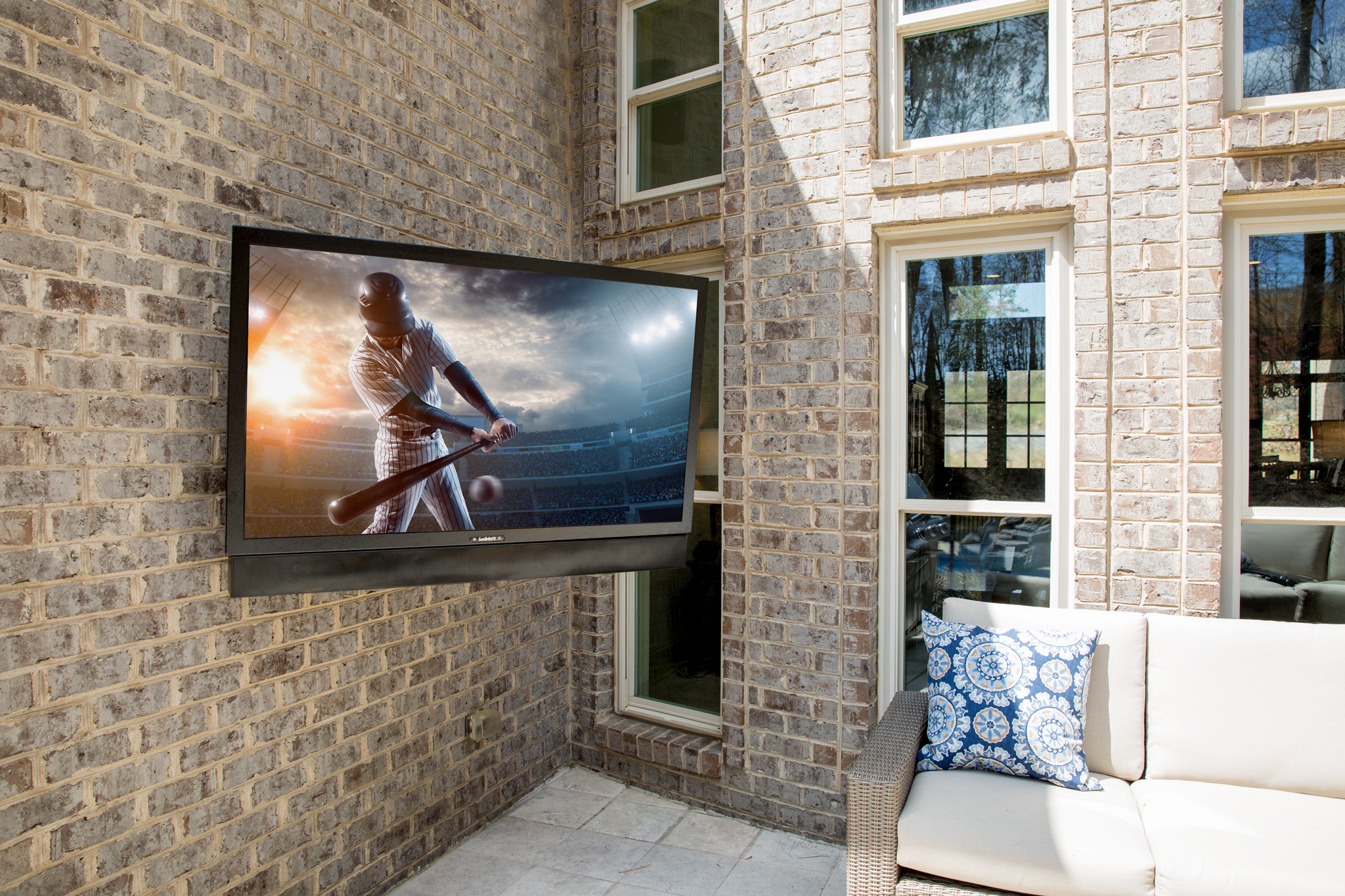 SunBrite outdoor television on a brick patio